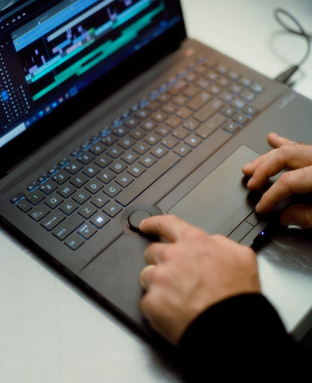 professional video editor at computer